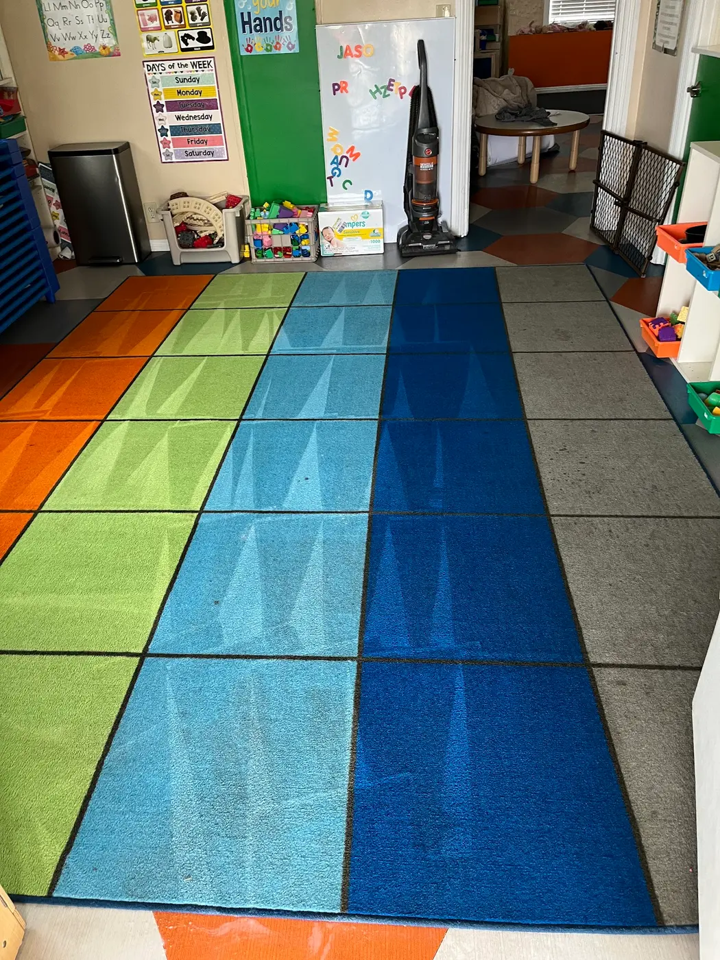Area rug, soiled field beside the cleaned rug after cleaning
