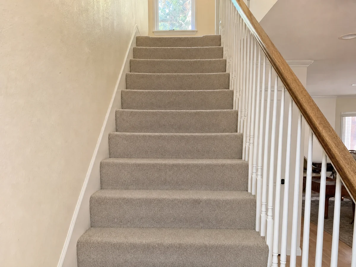 Carpeted stairs, soiled treads after cleaning